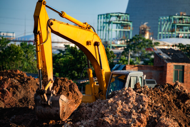 Excavators are assignments and refinery background